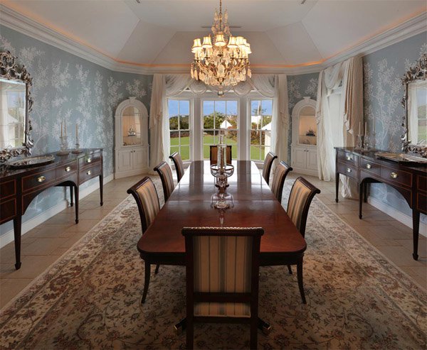 Graced with an impressive provenance and located just minutes from Hamilton, this grandly proportioned 14-acre Bermuda beachfront estate features a graceful dining room with hand-painted wallpaper from China.