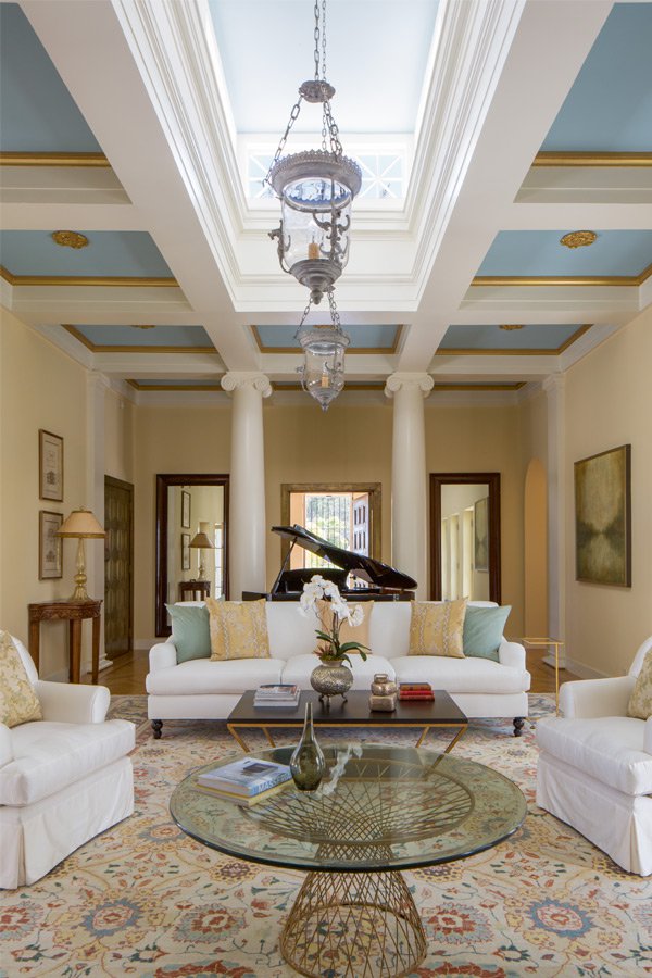 The neo-classical inspired living room, feature gold in its paneled ceiling. Photograph: Roger Davies