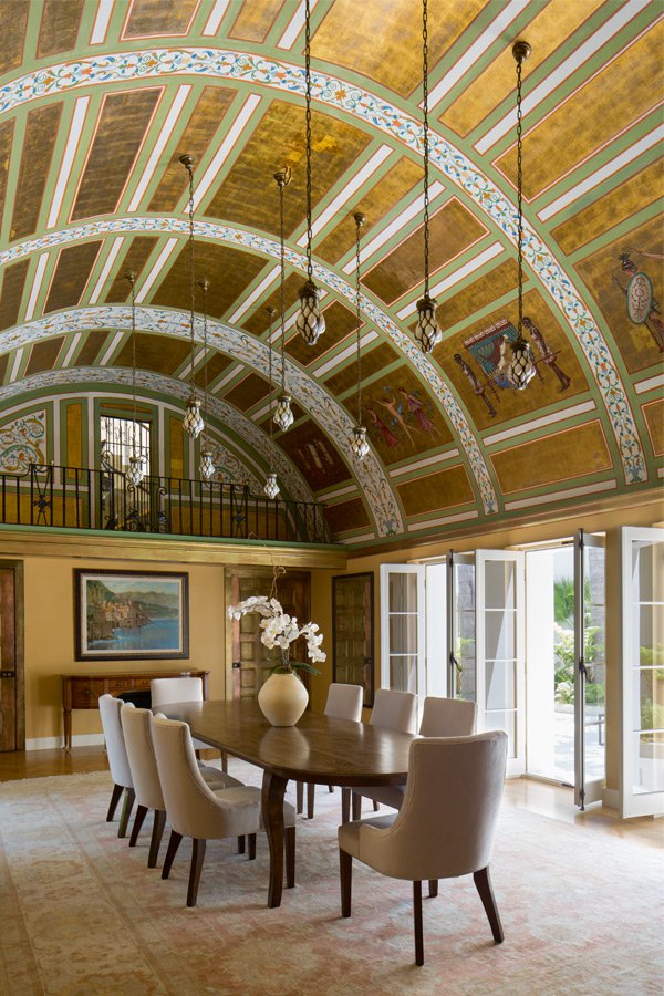 The unique barrel-vaulted dining room features gold leaf in its ceiling. Photograph: Roger Davies