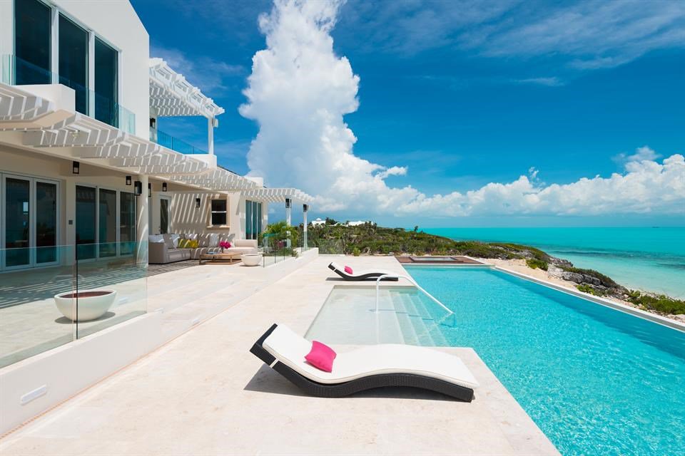 6 Bedrooms,  5,960 sq. ft.Live a life of spectacular luxury within this magnificently constructed estate on Long Bay Beach, Providenciales. Villa Isla is built on one of the higher beach dunes and comprises five beachfront bedrooms, six bathrooms, and 5,960 sq. ft. of living space. Built to very high specifications by one of the island's renowned builders, this villa boasts grand architectural features and fine finishes throughout.