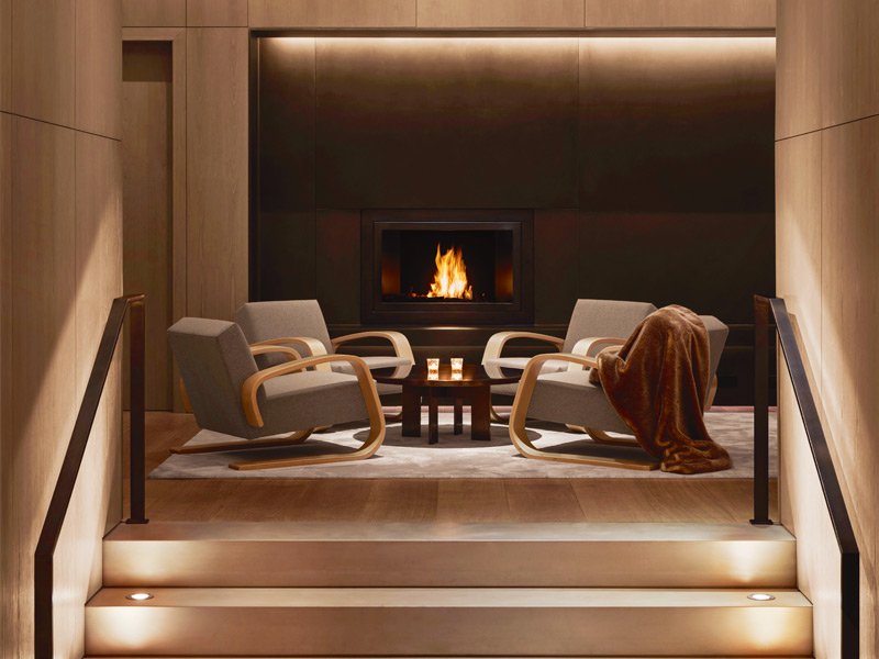 A customized version of HearthCabinet's ventless fireplace features in the lobby of the New York EDITION hotel.