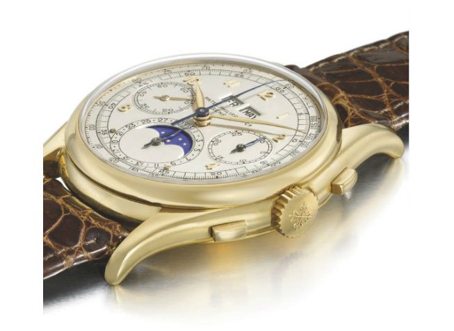 A unique and historically important Ref. 1527 Patek Philippe (1943) 18k gold perpetual calendar chronograph wristwatch with moon phases, which sold for $5,708,885 at Christie’s Geneva in 2010.