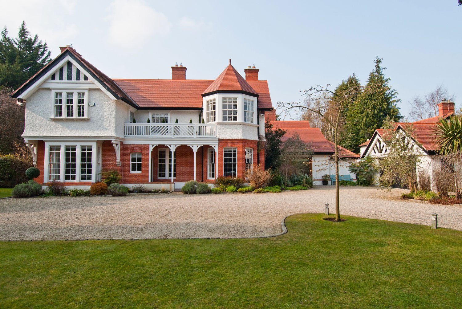 In Dublin, Ireland, Kenure is one of the finest homes in the affluent suburb of Foxrock. The historic property stands on an acre of secluded and imaginatively laid out gardens.