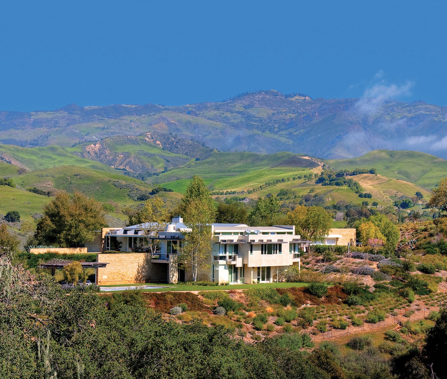 This architecturally significant modernist house and equestrian facility is set within 116 private acres of ranchland in the Santa Ynez Valley.