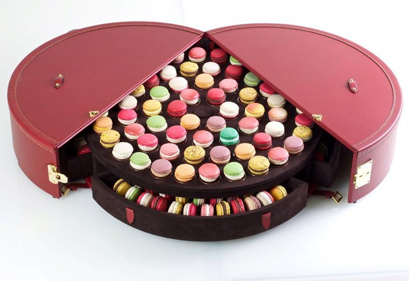 In Moyat’s trunk for Pierre Hermé, each delicate macaron can be placed on individual Limoges enamel plates.