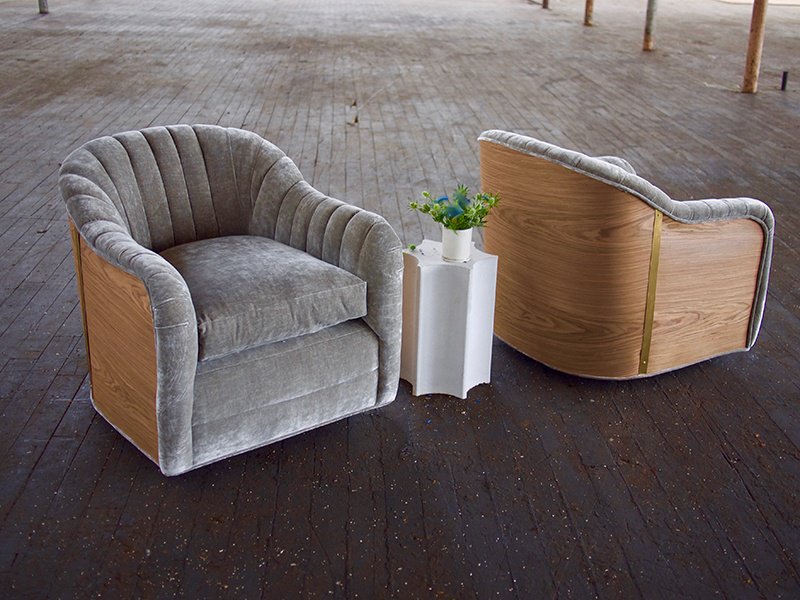Elizabeth Ingram’s furniture line includes the Fabiola Swivel Chair in walnut and brass, and the concrete Stelletta Pedestal.