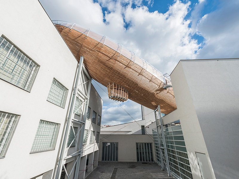 The DOX Centre for Contemporary Art is Prague’s art hub, featuring rotating exhibitions including Martin Rajniš’s wooden structure—138 feet long and 33 feet wide—inspired by the zeppelins that cruised the skies at the dawn of the 20th century. Photograph: Jan Slavík