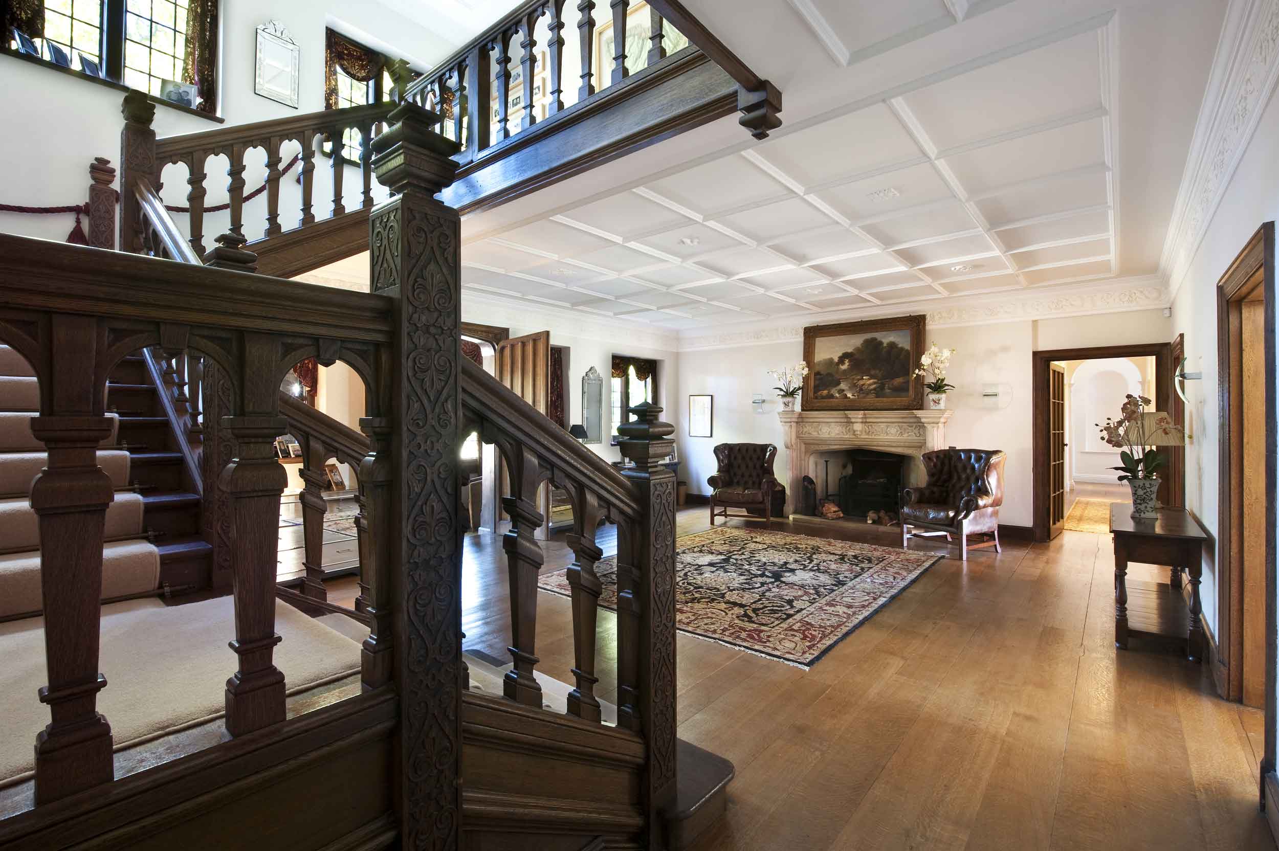 Lock House is a beautiful example of the Vernacular Revival style. The Jacobean-style staircase, which dominates the grand foyer, is among the original turn-of-the-century details.
