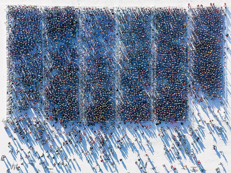 One of the pieces in Antoine Rose’s Jeux d’Hiver series, Entering the Hive, reveals an apparently herd-like behavior among cross-country skiers at a race in Saint-Moritz, Switzerland.