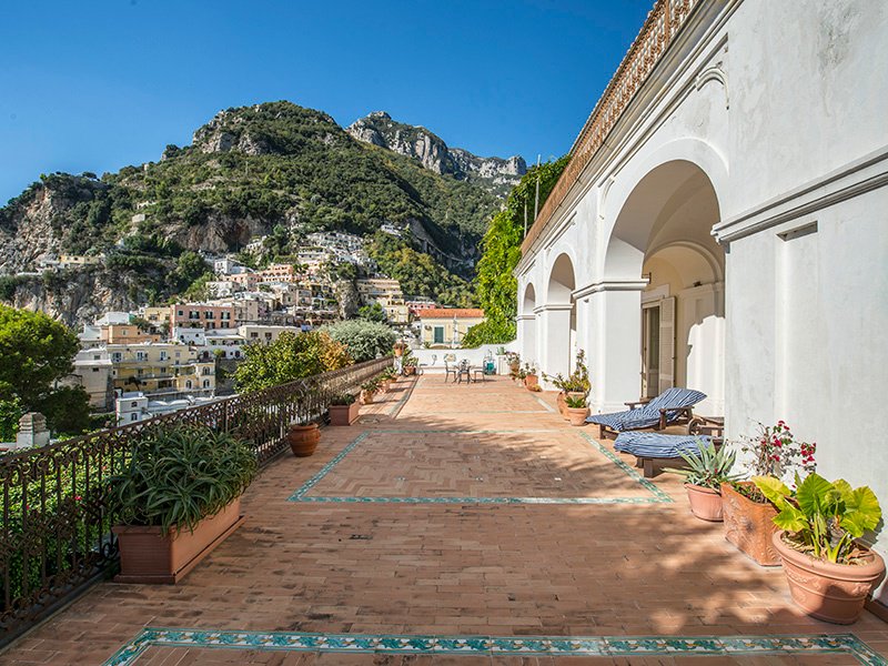 This two-bedroom apartment in Positano is a short walk from the beach, and comes complete with a 108-square-foot (10 sq m) garage that could be enlarged.