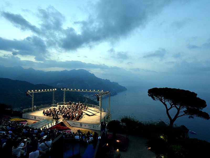 Villa Rufolo hosts the annual Ravello Festival, where orchestras perform on a stage offering dramatic views of the Tyrrhenian Sea.