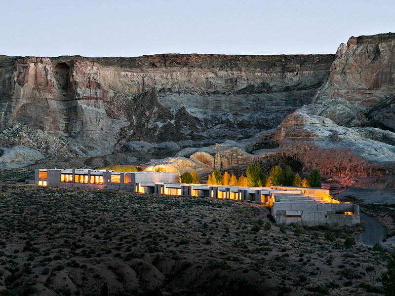 The suites at Amangiri, with their clean lines and natural materials, complement the qualities of the surrounding Utah desert, offering breathtaking views of the mesa and dunes.
