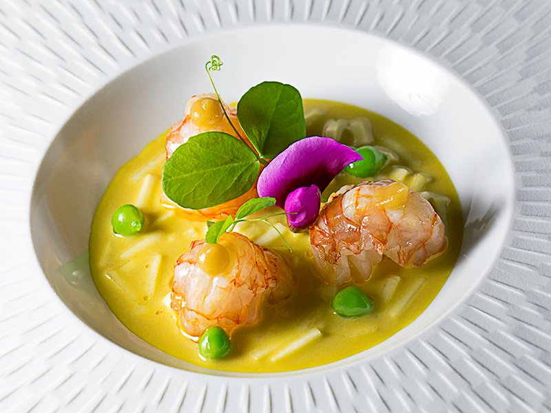 One of Carme Ruscalleda's signatures: a dish of prawns with saffron, celery, and peas showcases the freshest seafood.