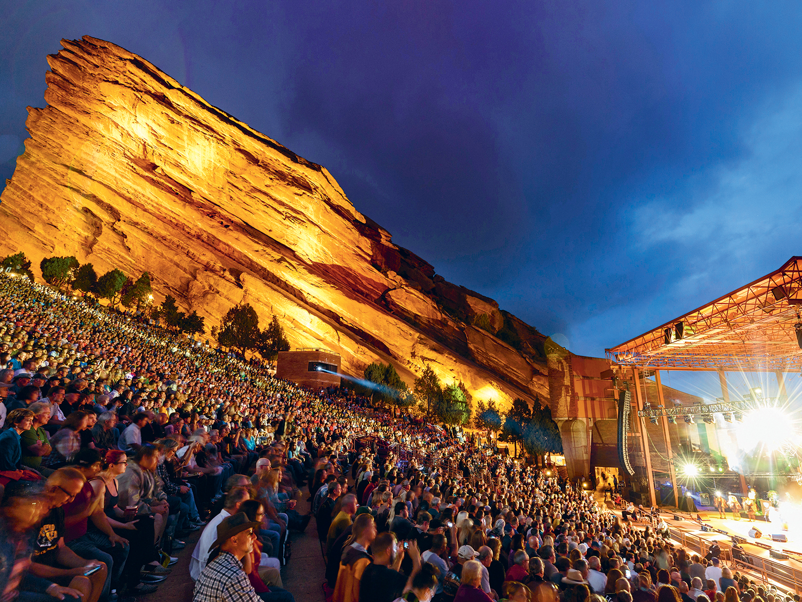 A full crowd watch a concert at Red Rocks Amphitheatre, near Denver, Colorado