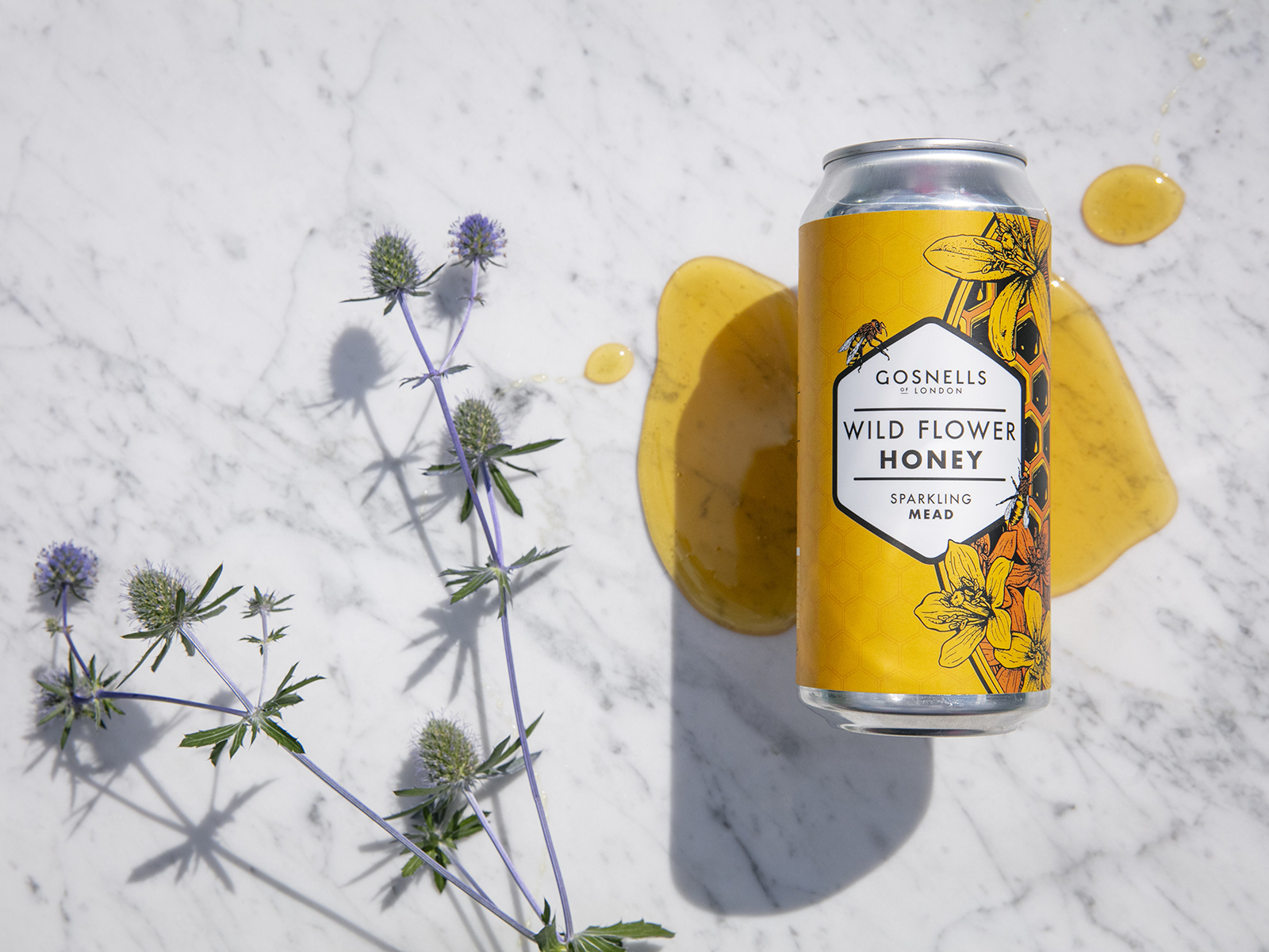 A can of Gosnell's honey mead with wild flowers and honey